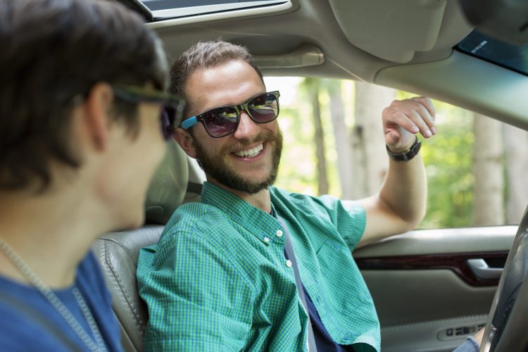a-couple-man-and-woman-on-a-road-trip-seated-in-2025-04-03-01-33-24-utc-scaled.jpg
